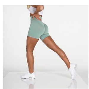 NVGTN SAGE GREEN SHORTS SIZE MEDIUM